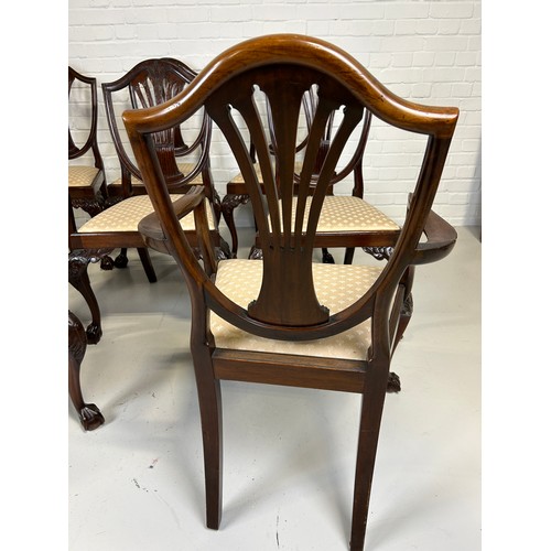 517 - A SET OF EIGHT SHERATON DESIGN DINING CHAIRS PURCHASED FROM HARRODS IN LONDON, 

To include two armc... 