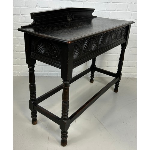 425 - AN EBONISED AESTHETIC DESIGN TABLE, 

88cm x 70cm x 38cm