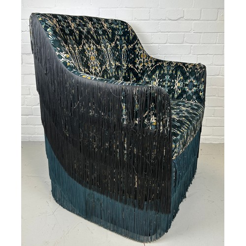 468 - A DESIGNER ARMCHAIR WITH FRINGED TASSLES UPHOLSTERED IN 'PSYCHADELIC' VELVET FABRIC, 

91cm x 80cm x... 