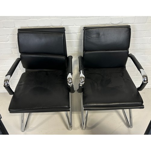 484 - A SET OF FOUR CHROME AND BLACK LEATHER DESK CHAIRS, 

90cm x 55cm x 50cm each.