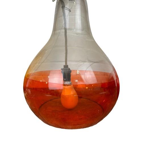 559 - A PAIR OF GLASS 'ALCHEMIST JAR' LIGHTS ALONG WITH AN AMBER GLASS LAMP (3), 

Largest 57cm H