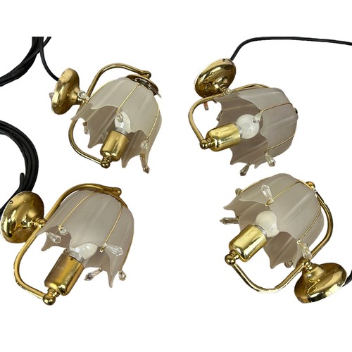 558 - A SET OF FOUR ART DECO STYLE BRASS WALL LIGHTS WITH OPAQUE GLAS SHADES,

20cm x 20cm each.