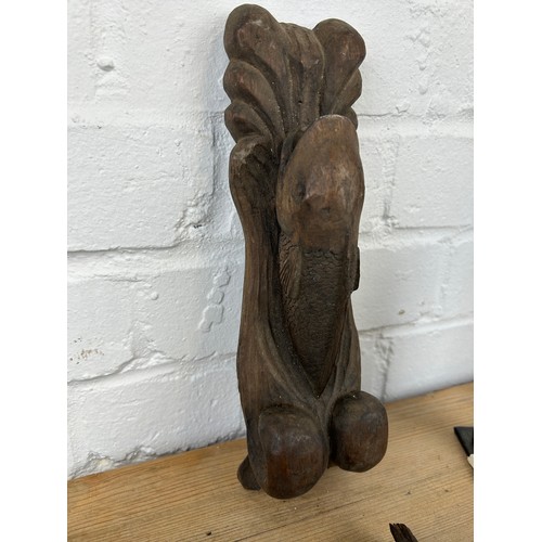 239 - THREE AFRICAN TRIBAL WOODEN ITEMS (3) 

To include a figure, phallic shaped plaque and another. 

Fi... 