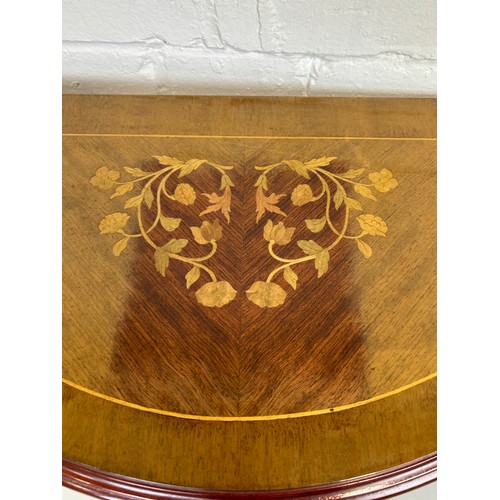 460 - A PAIR OF DEMI LUNE FRENCH STYLE CONSOLE TABLES WITH GILT METAL MOUNTS AND MARQUETRY DETAIL,