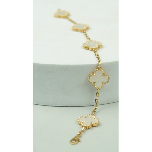 326 - A VAN CLEEF AND ARPELS 18CT GOLD AND MOTHER OF PEARL FLORAL BRACELET,

19cm L