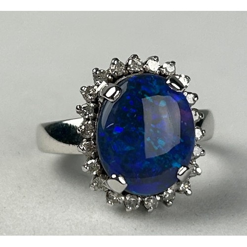 347 - AN 18CT GOLD BLACK OPAL RING, 

Weight: 5.4gms