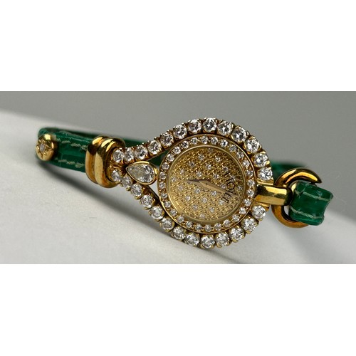 330 - A DIAMOND ETOILE WATCH APPROXIMATELY THREE CARATS IN 14CT GOLD WITH GREEN LEATHER STRAP,