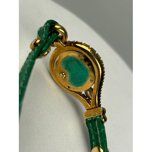 330 - A DIAMOND ETOILE WATCH APPROXIMATELY THREE CARATS IN 14CT GOLD WITH GREEN LEATHER STRAP,