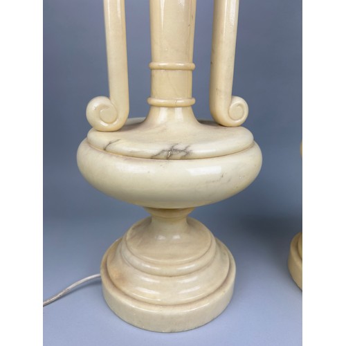 431 - A PAIR OF ITALIAN ALABASTER TABLE LAMPS IN THE CLASSICAL STYLE 

75cm H each