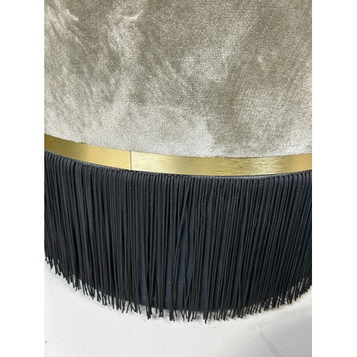 495 - FOUR LOW STOOLS UPHOLSTERED IN GREY VELVET FABRIC WITH FRINGED TASSELS ALONG WITH ANOTHER SMALLER EX... 