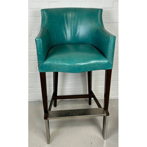 489 - A LARGE BAR STOOL UPHOLSTERED IN BLUE LEATHER FABRIC WITH METAL STUDS, 

122cm x 62cm x 70cm

Proven... 