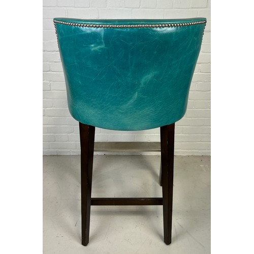 489 - A LARGE BAR STOOL UPHOLSTERED IN BLUE LEATHER FABRIC WITH METAL STUDS, 

122cm x 62cm x 70cm

Proven... 