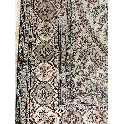 635 - A PERSIAN DESIGN CARPET, 

285cm x 184cm