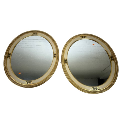 601 - A PAIR OF OVAL WALL MIRRORS (2), 

71cm x 62cm