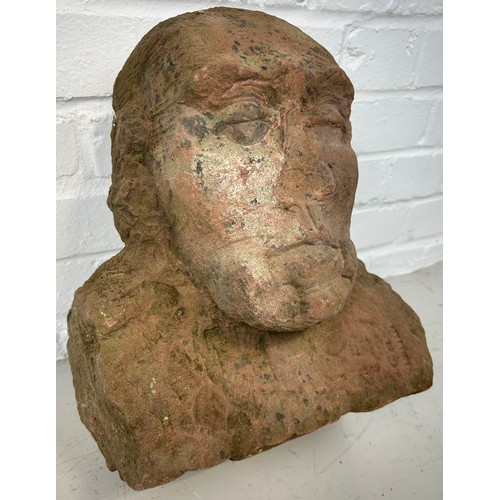 413 - A LIFE SIZE CARVED RED SANDSTONE BUST, 

Possibly Medieval. 

32cm x 29cm