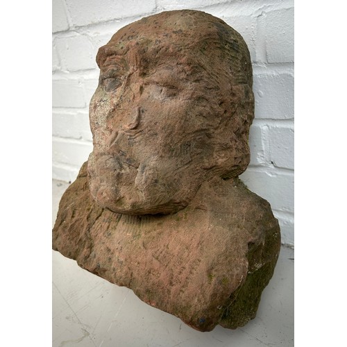 413 - A LIFE SIZE CARVED RED SANDSTONE BUST, 

Possibly Medieval. 

32cm x 29cm