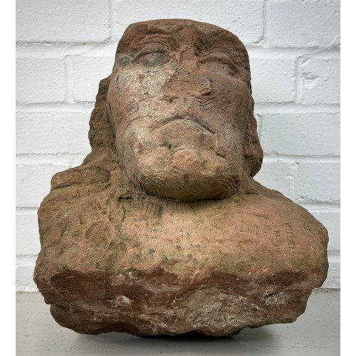 413 - A LIFE SIZE CARVED RED SANDSTONE BUST, 

Possibly Medieval. 

32cm x 29cm