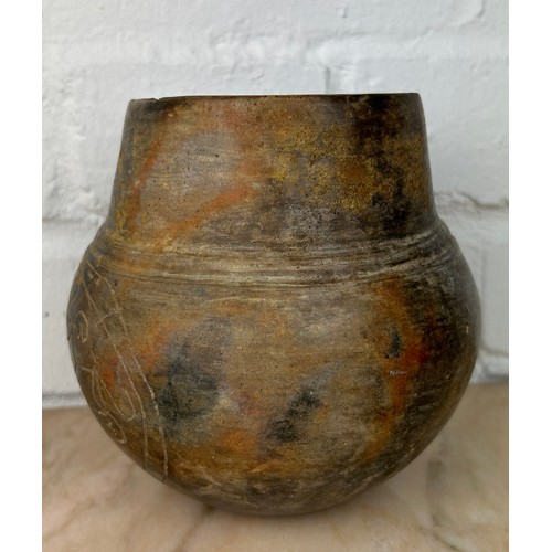 232 - A PRE-COLUMBIAN COLIMA RED WARE VESSEL ENGRAVED WITH POSSIBLE WATER PIPEWORK SYMBOLS,

13cm x 13cm