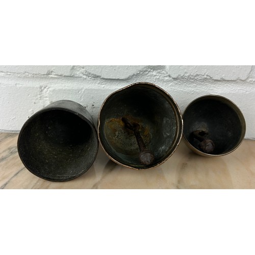 234 - THREE CAST IRON AND BRONZE BELLS (3), 

Largest 12cm x 7cm