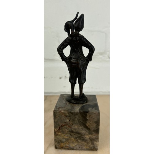 248 - AFTER FRANZ IFLAND (1862-1925): A SIGNED BRONZE CLOWN WITH A CAT, 

11cm H 
16cm with stand.