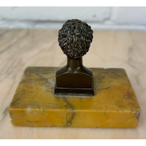 247 - A SMALL BRONZE BUST 'EL LIBERTADOR' MOUNTED ON A SIENNA MARBLE STAND,

6cm H
10cm x 8cm with stand.