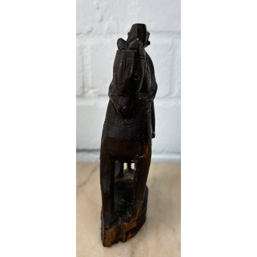 226 - AN INDIAN WOODEN SCULPTURE OF A HORSE AND RIDER, 

16cm x 9cm