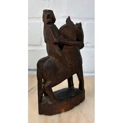 226 - AN INDIAN WOODEN SCULPTURE OF A HORSE AND RIDER, 

16cm x 9cm