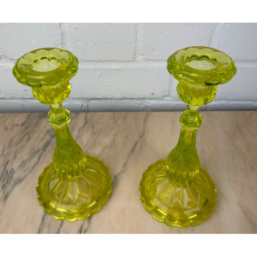 255 - A PAIR OF URANIUM GLASS CANDLESTICKS,

20cm H each.