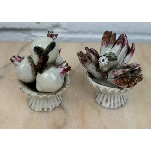 153 - A PAIR OF BIONIC PORCELAIN MADE WITH TRADITIONAL CHINESE THEMES, 

Chayote, pomegranate, longevity p... 