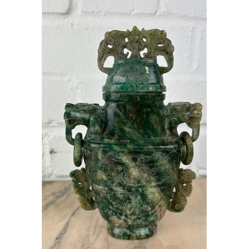 202 - A CHINESE JADE LIDDED URN, 

Probably 20th Century or modern. 

19cm x 12cm