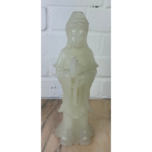 203 - A CHINESE WHITE JADE FIGURE OF A GUANYIN, 

Probably 20th century or modern. 

27cm H