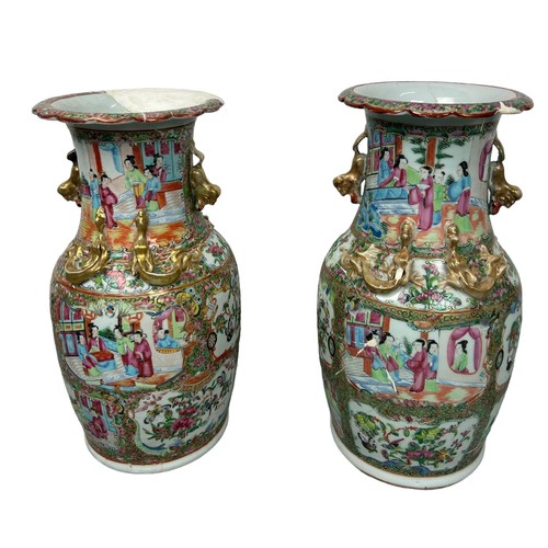 215 - A PAIR OF PINK CHINESE CANTON FAMILLE ROSE VASES,

35cm H each.