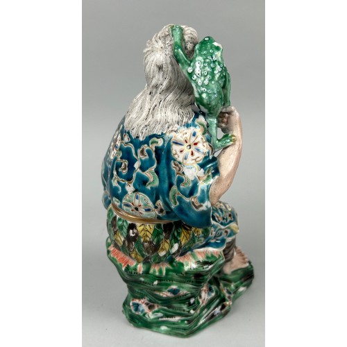 175 - A JAPANESE PORCELAIN GROUP DEPICTING A MAN HOLDING A FROG, 

26cm x 15cm