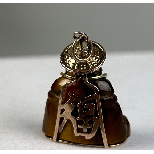 367 - A TIGERS EYE GOLD BUDDHA,

Weight 7.3gms

3cm x 2cm