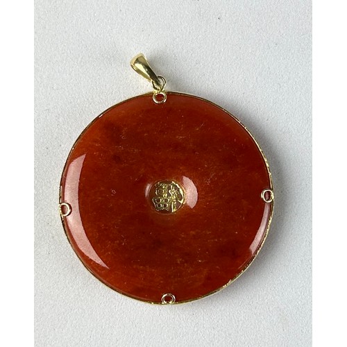 359 - A LARGE CHINESE RED JADE PENDANT IN 14CT GOLD, 

Weight 13.4gms