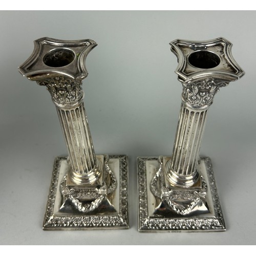 298 - A PAIR OF RICHARD MARTIN AND EBENEZER HALL SILVER CANDLESTICKS (2),

Weight: 768gms 
 
19cm H each.