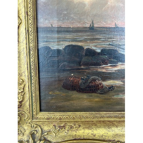 64 - AN OIL ON CANVAS PAINTING DEPICTING BOATS BESIDES THE SEA, 

44cm x 29cm 

Mounted in a gilt frame.