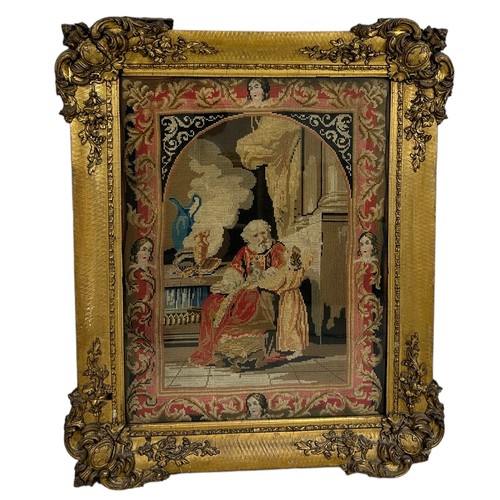 625 - A 19TH CENTURY SAMPLER MOUNTED IN A GILTWOOD FRAME, 

76cm x 60cm