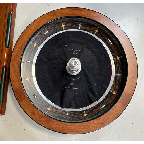 505 - PALM BEACH CASINOS: A FULL SIZE ROULETTE WHEEL BY JOHN HUXLEY ALONG WITH ROULETTE TABLE, 

The wheel... 