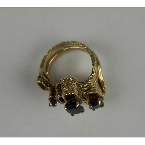 335 - A TWO PIECE 1970'S 14CT GOLD RING SET WITH SAPPHIRES, 

Weight: 10.7gms 

The bark effect rings of a... 