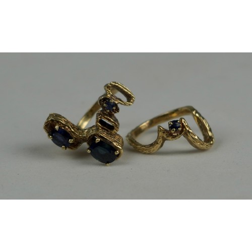 335 - A TWO PIECE 1970'S 14CT GOLD RING SET WITH SAPPHIRES, 

Weight: 10.7gms 

The bark effect rings of a... 