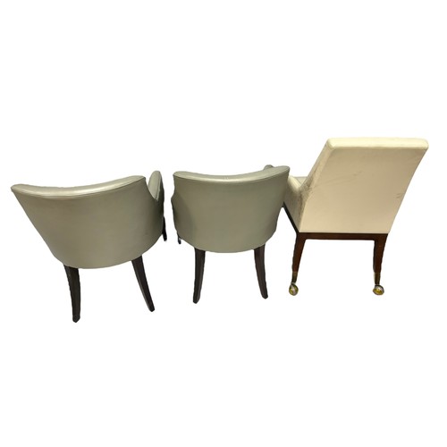 498 - A PAIR OF ARMCHAIRS UPHOLSTERED IN GREY LEATHER ALONG WITH A SIMILAR ARMCHAIR WITH YELLOW METAL CAST... 