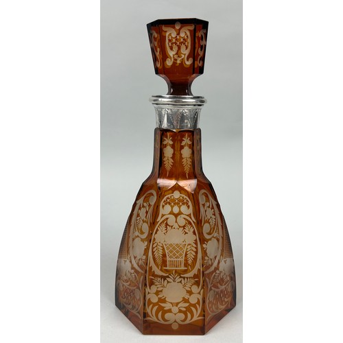 259A - AN AMBER GLASS DECANTER WITH SILVER COLLAR CIRCA 1900, 

30cm H

Possibly Venetian, or Spanish.