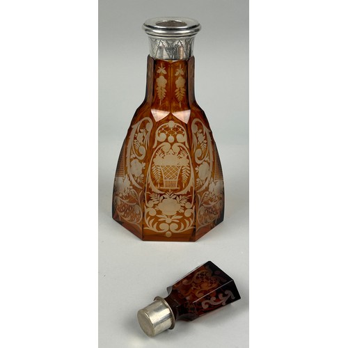 259A - AN AMBER GLASS DECANTER WITH SILVER COLLAR CIRCA 1900, 

30cm H

Possibly Venetian, or Spanish.