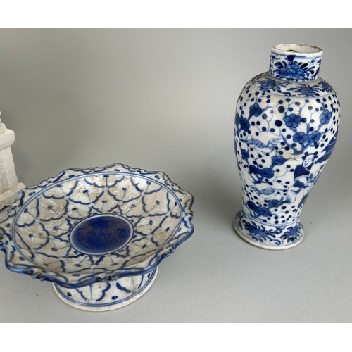 72 - A MIXED COLLECTION OF CHINESE ANTIQUES, 

To include blanc de chine foo dog, blue and white vase, st... 