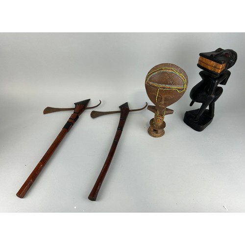 549 - A COLLECTION OF AFRICAN ITEMS (4) 

To include two wooden figures and two axes

Axes 60cm L
Tallest ... 