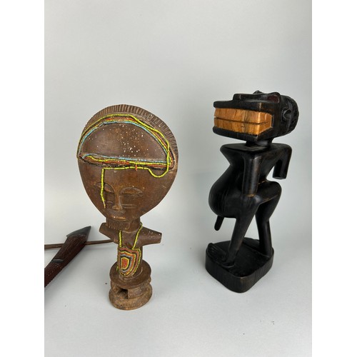 549 - A COLLECTION OF AFRICAN ITEMS (4) 

To include two wooden figures and two axes

Axes 60cm L
Tallest ... 