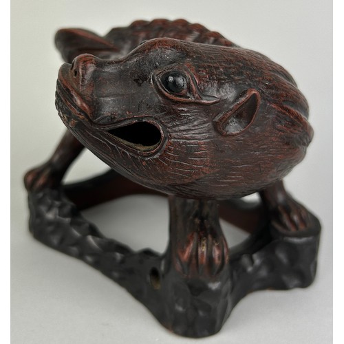 61 - A CHINESE METAL FIGURE OF A LION, 

13cm x 11cm