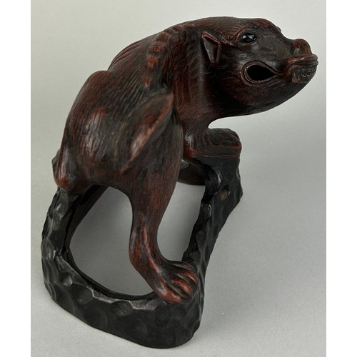 61 - A CHINESE METAL FIGURE OF A LION, 

13cm x 11cm