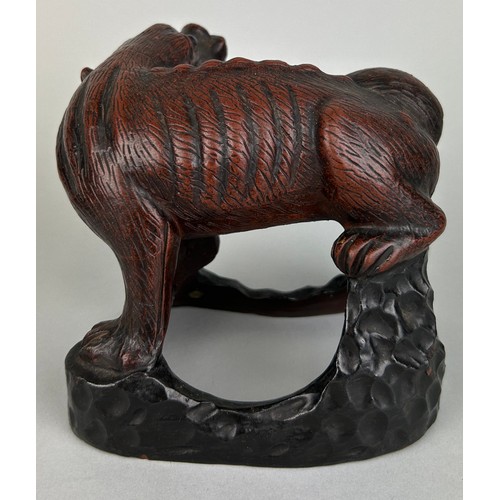 61 - A CHINESE METAL FIGURE OF A LION, 

13cm x 11cm